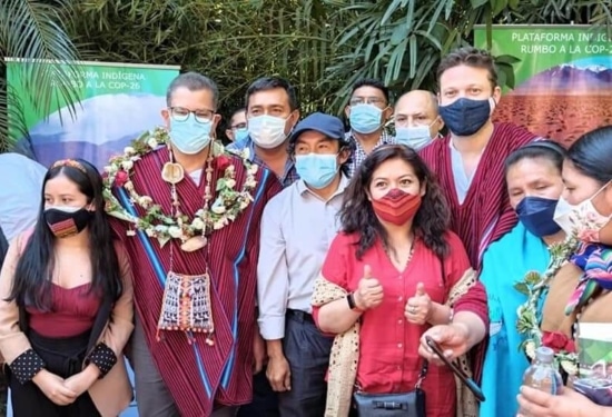 group of people wearing masks at the The Monkoxi of Lomerío share knowledge with UN Climate Conference COP 26 President, Mr Alok Sharma