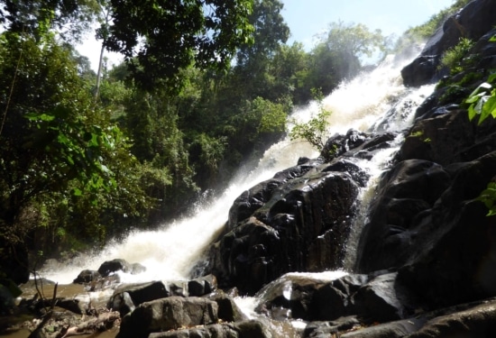 water rushing down a rocky hillside
