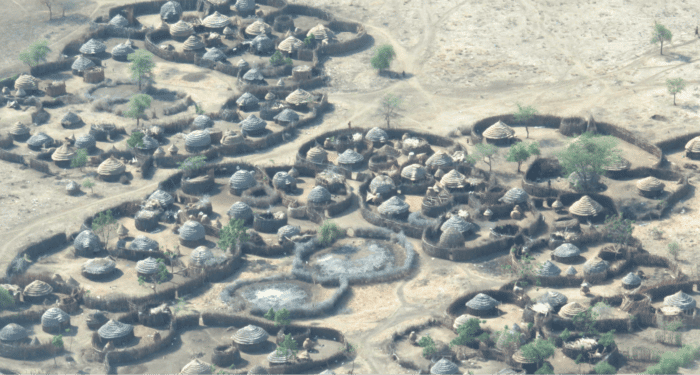 arieal photography of a village of circular houses